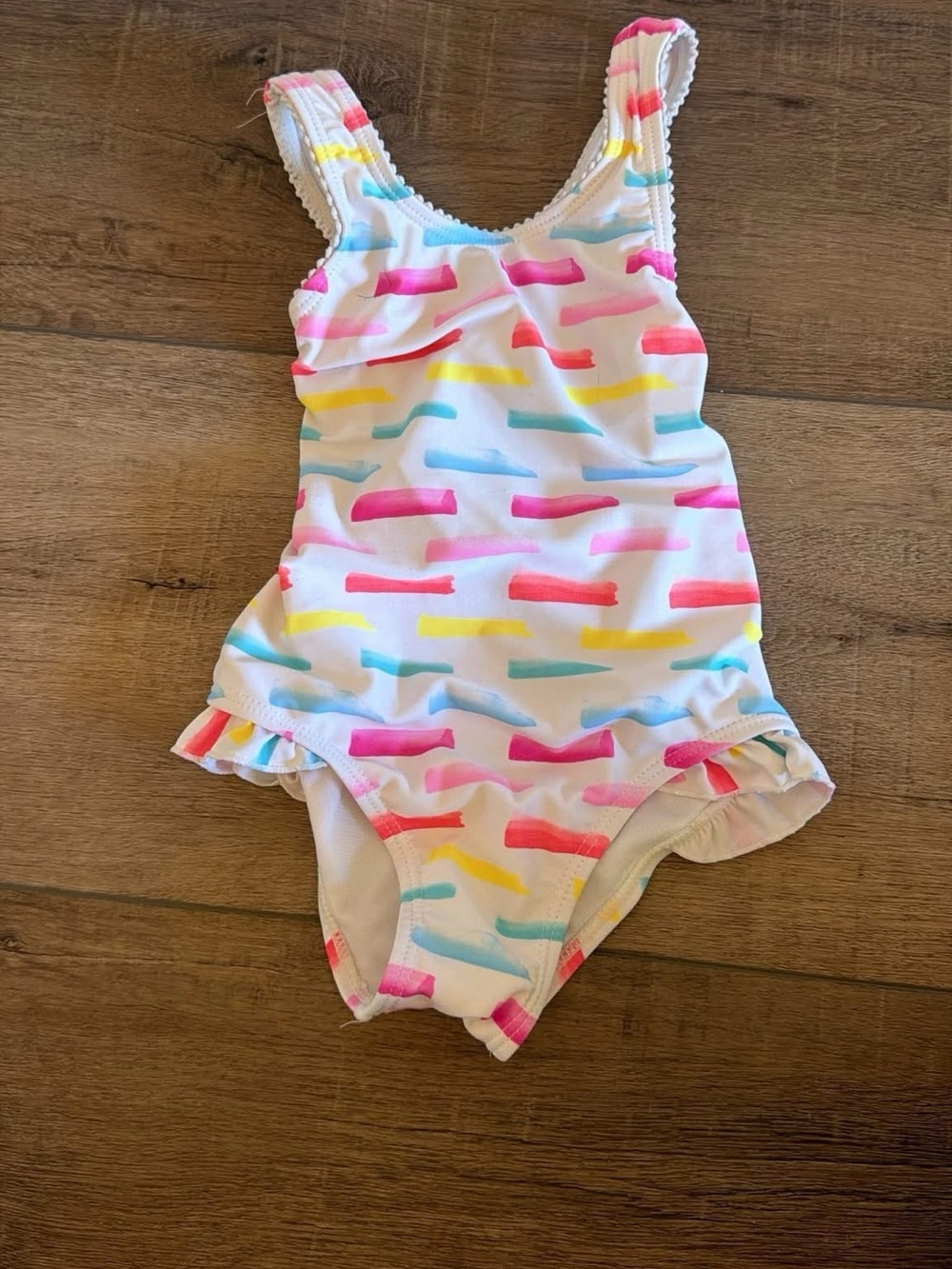 Kids White One-Piece Swimsuit with Pink, Blue & Yellow Accents
